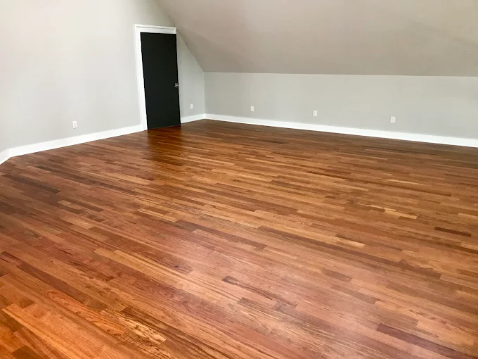 Open living space, refinished hardwood — True North Craftsmen, Hamilton County IN